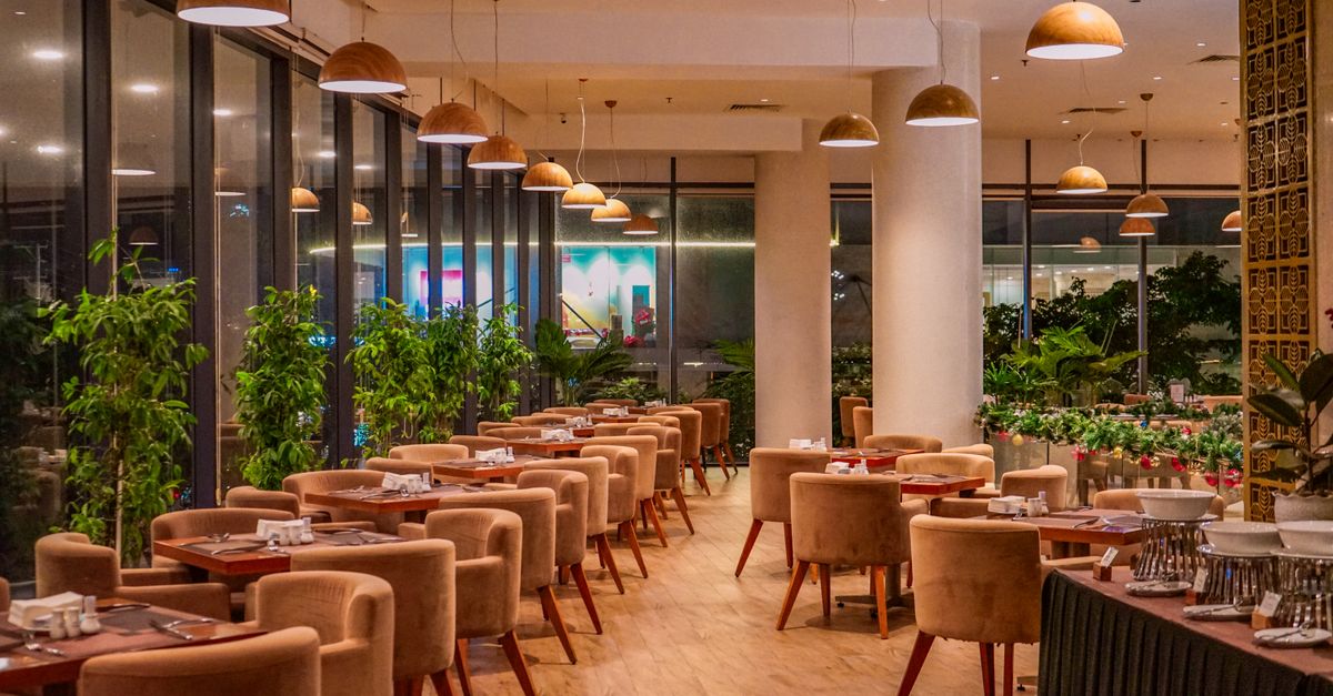 Dining room of an independent restaurant with set tables