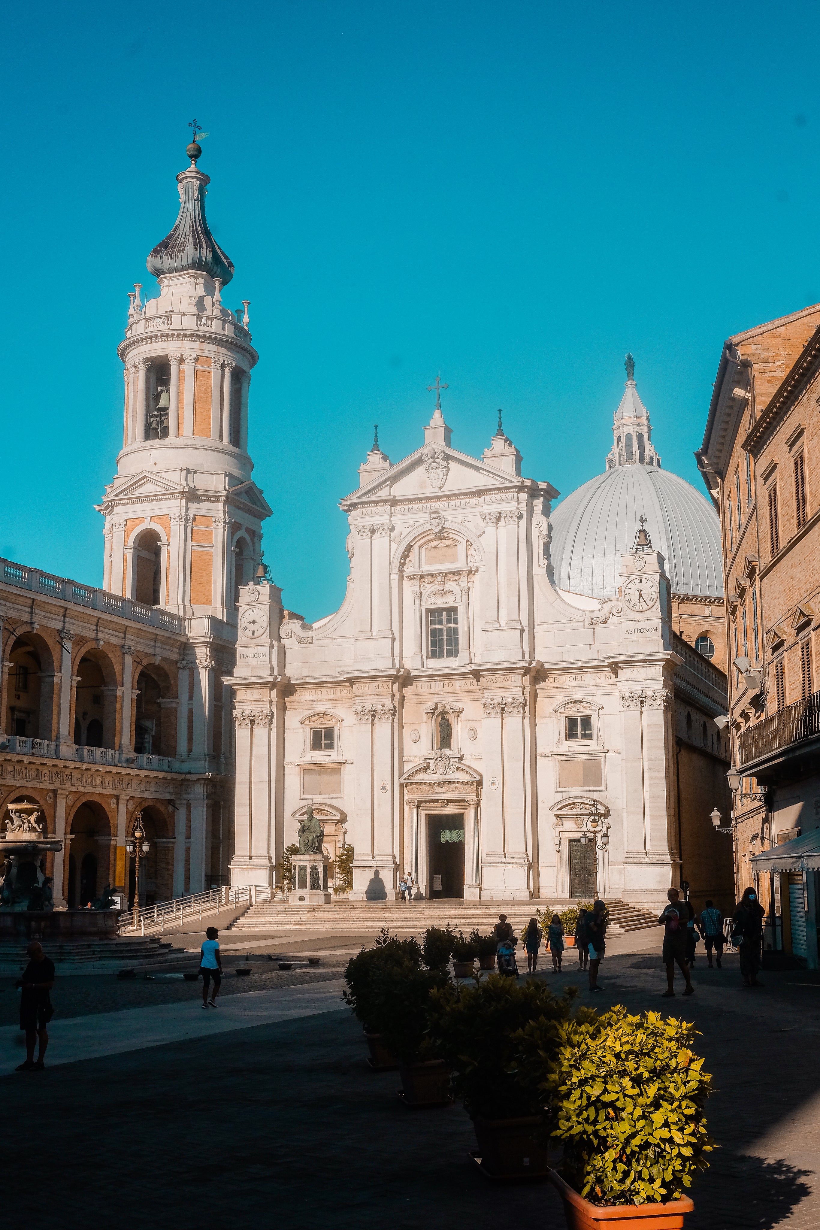 courtyard-on-a-sunny-day-with-a-large-white-religious-church